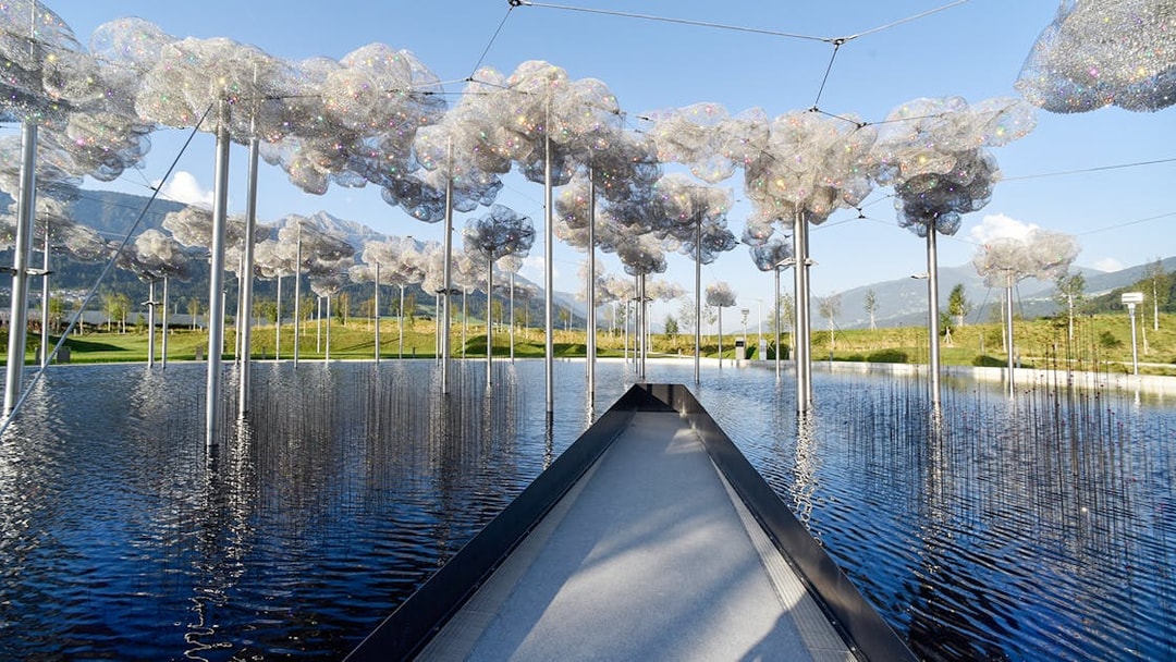Pathway through crystal cloud installation at Swarovski Crystal Worlds, Austria.