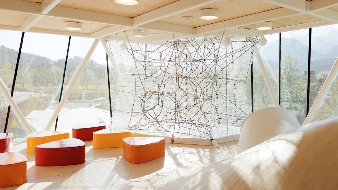 Visitors at Swarovski Crystal Worlds entrance, Innsbruck, Austria, using skip-the-line tickets.