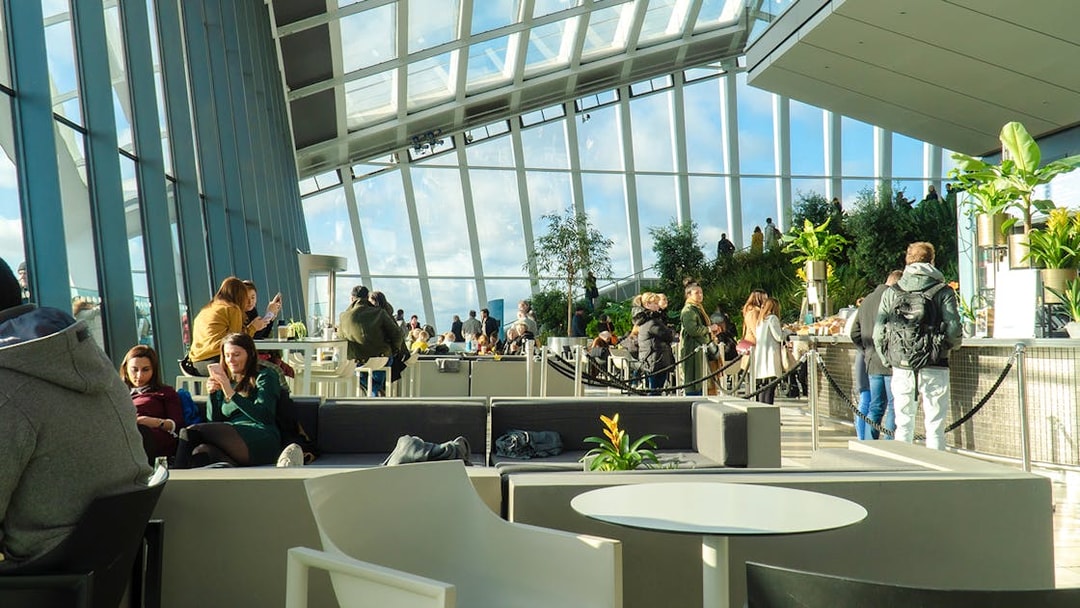 Visitors enjoying the view and greenery at Sky Garden, London.