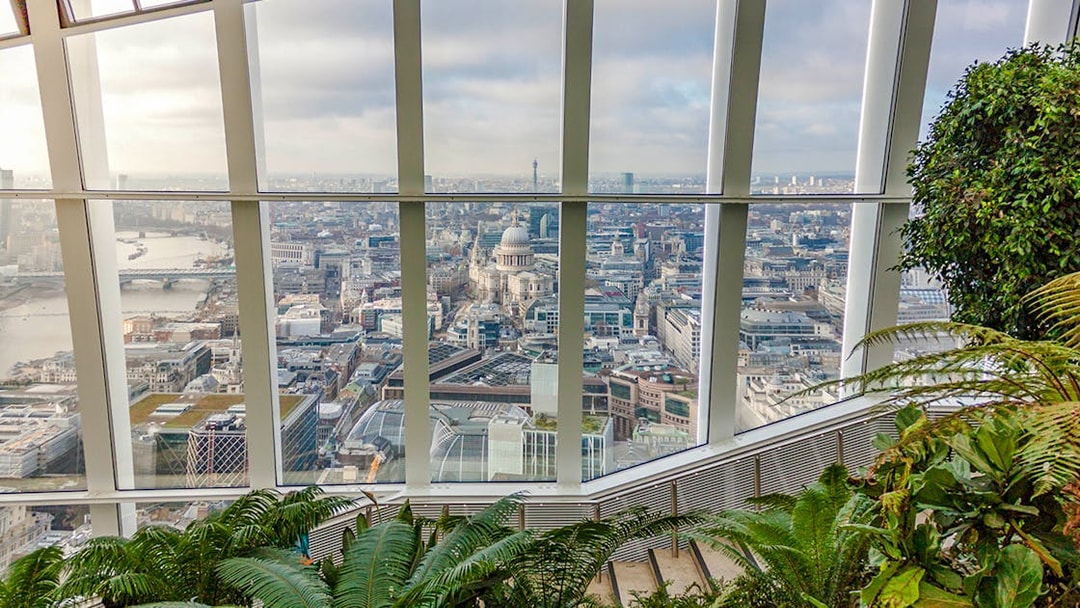 View of London skyline from Sky Garden with St. Paul's Cathedral visible.
