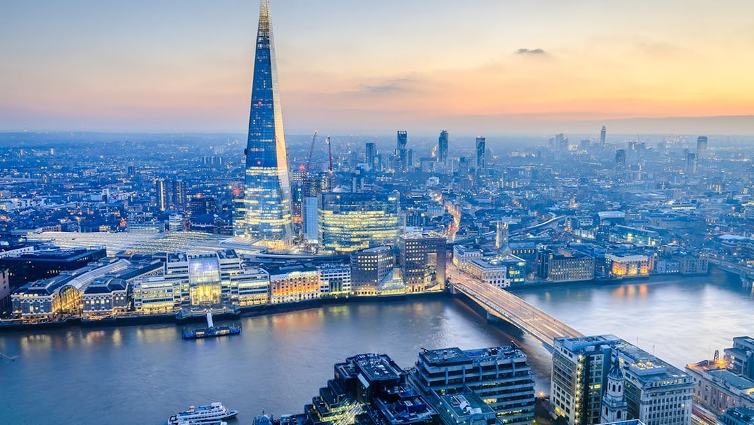 London skyline with the Shard at sunset, view over the Thames River.
