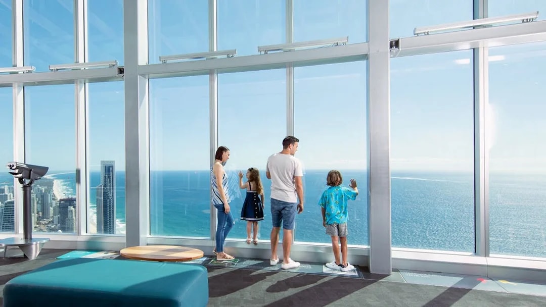 Visitors enjoying ocean views from SkyPoint Observation Deck, Gold Coast.