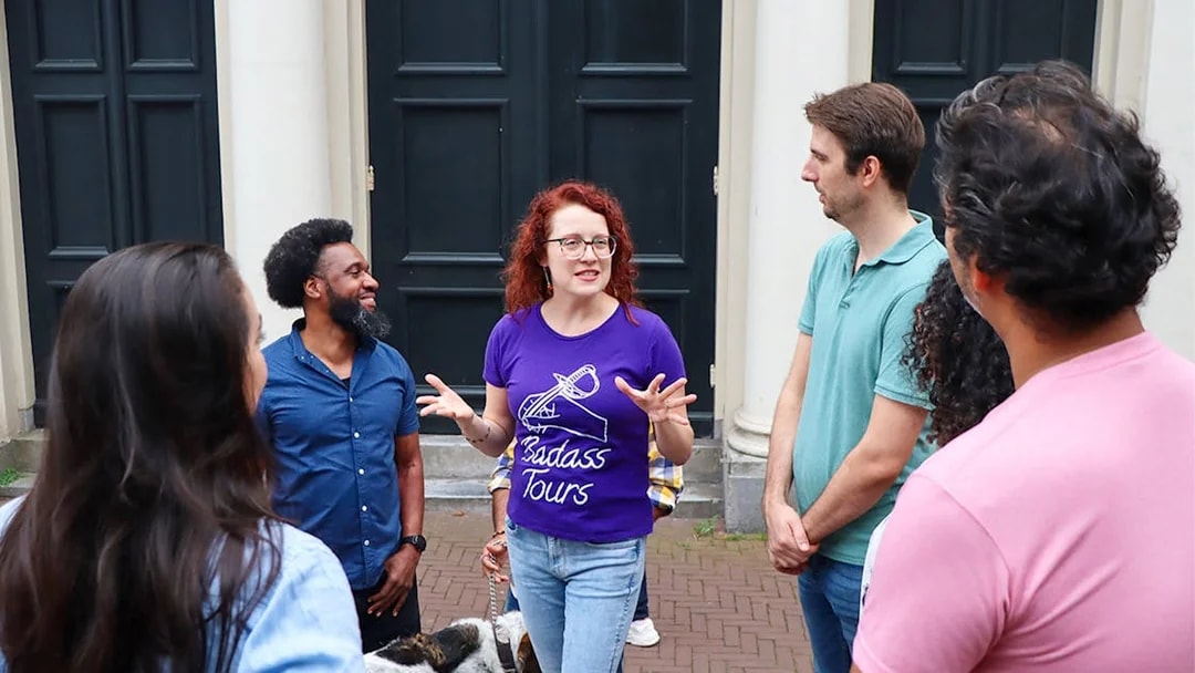 Tour guide leading a small group on a Hidden Gems Tour.