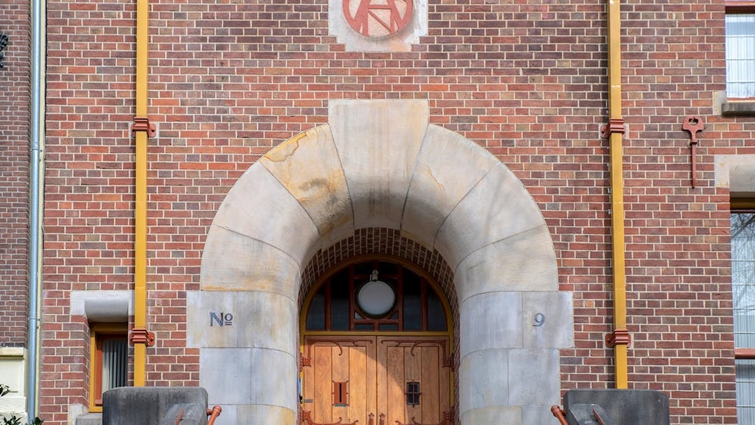 Entrance archway of De Burcht Van Berlage building in Amsterdam.