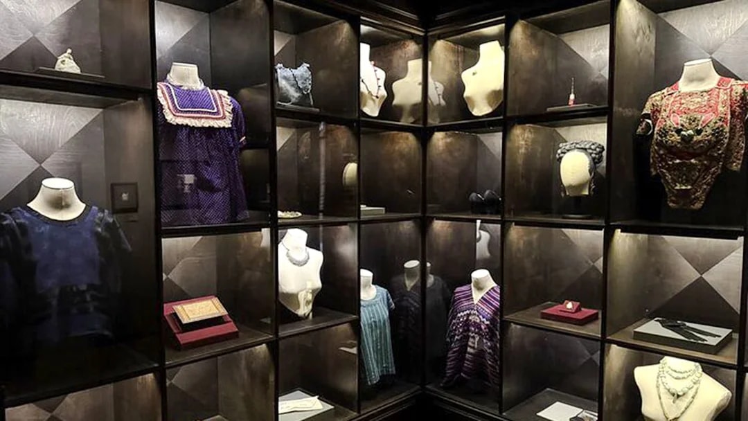 Frida Kahlo Museum display of traditional clothing and accessories in Mexico City.