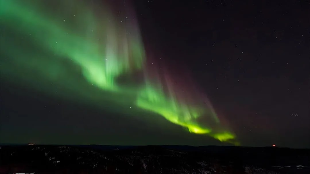 Northern Lights over Southern Iceland's lava fields and glaciers.