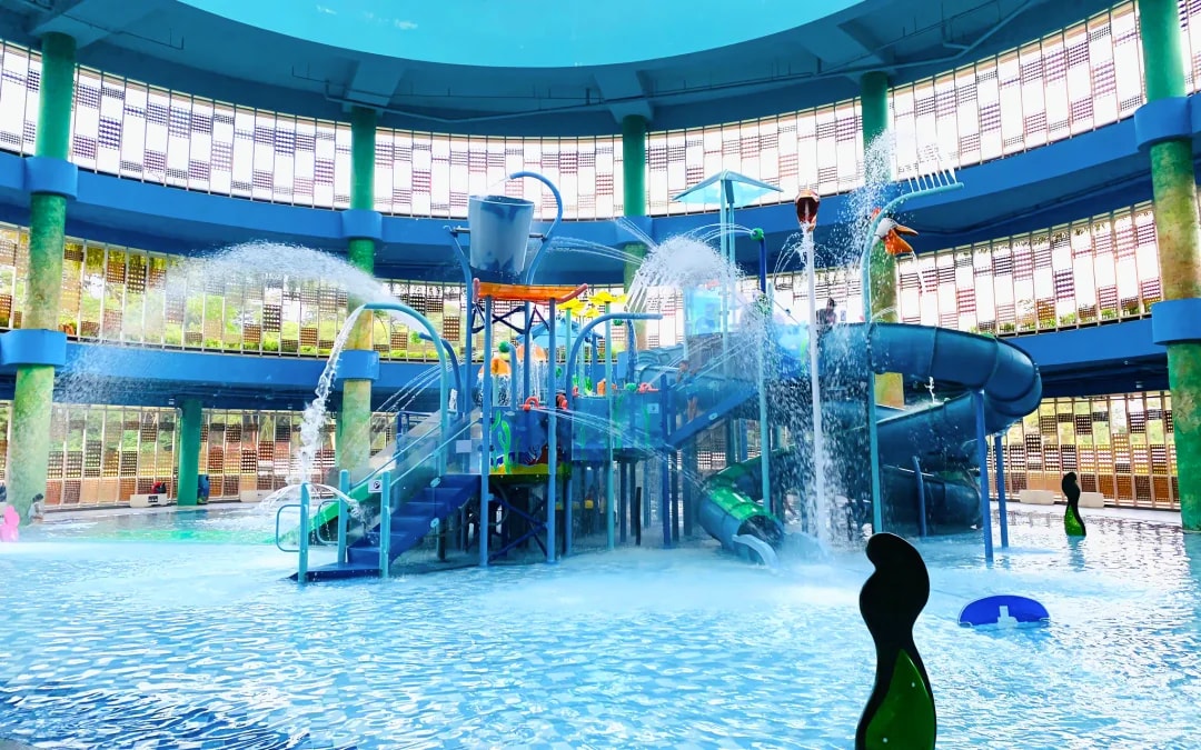 Water slide and splash area at an indoor water park in Singapore.