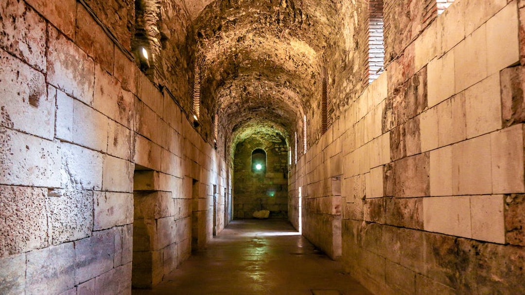 Diocletian's Cellar in Split, stone corridor from Game of Thrones tour.