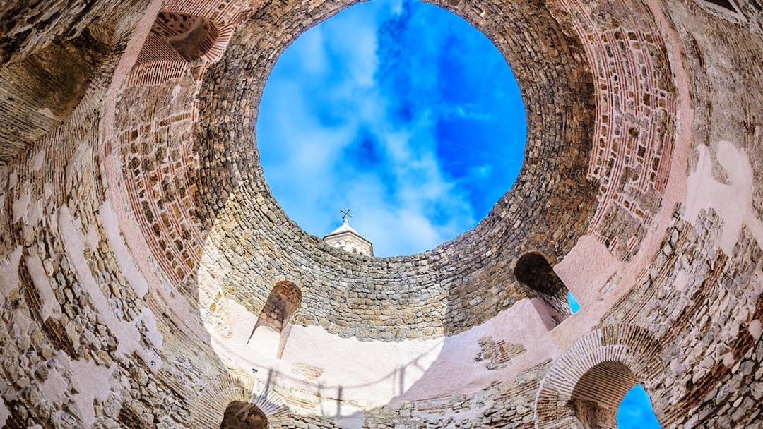 Diocletian's Cellar stone walls with open sky view, Split, Game of Thrones tour.