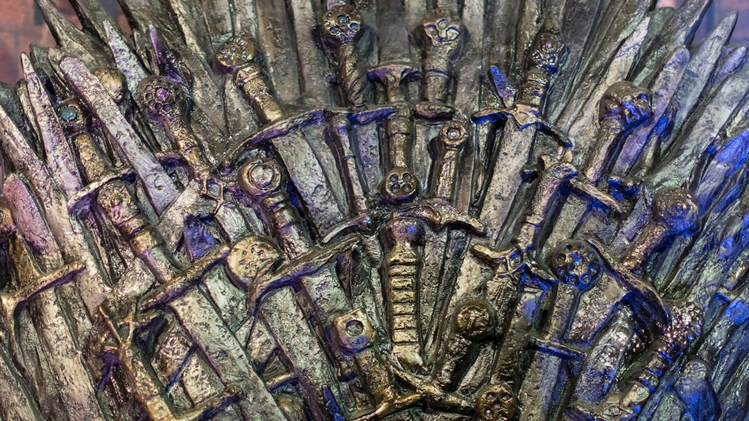 Iron Throne replica from Game of Thrones tour in Split, featuring swords and intricate details.