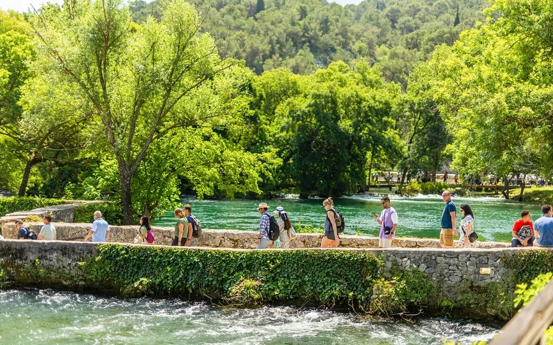From Split: Full-Day Trip to Krka National Park with Boat Ride & Swimming without Entry Tickets Image 1
