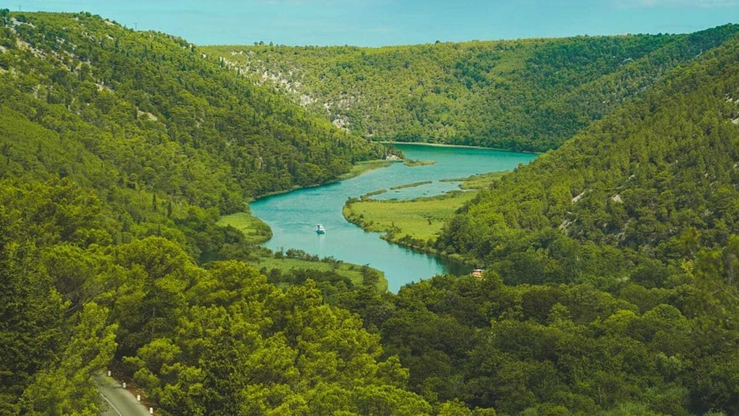 River winding through lush greenery in Krka National Park, Croatia.