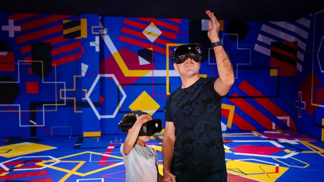 Visitors using VR headsets at Spotify Camp Nou Barça Museum exhibit.