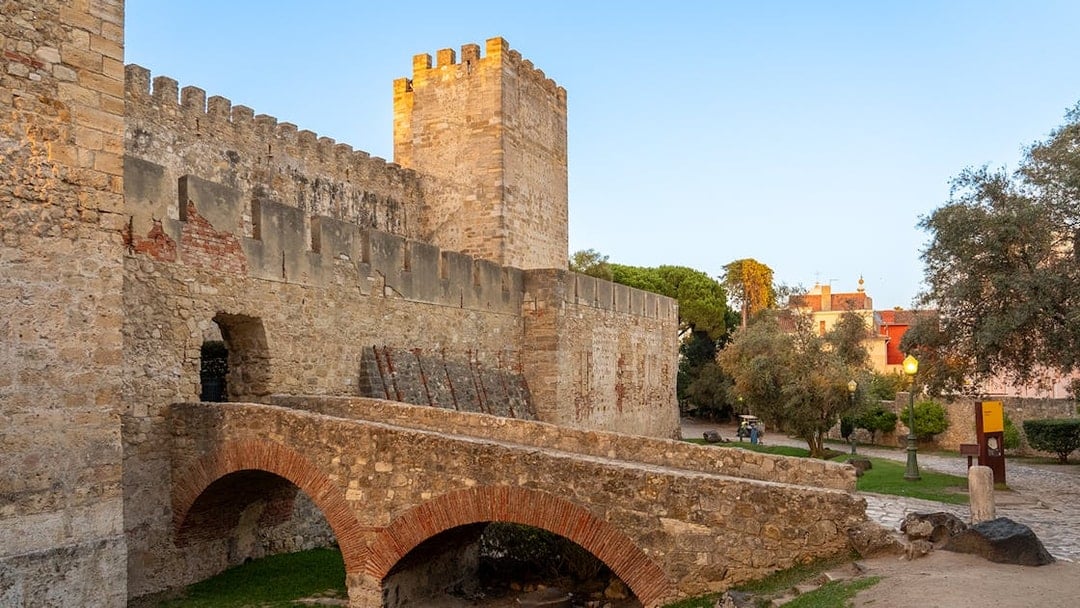 St George's Castle stone archways and walls in Lisbon, Portugal.