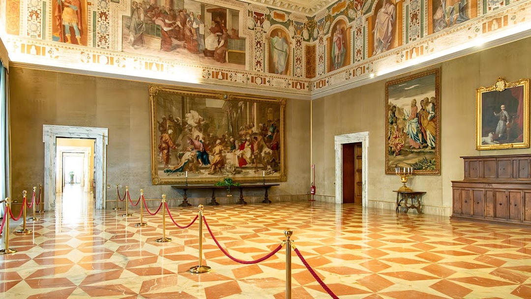 Interior of St. John Lateran with frescoes and ornate ceiling, Rome.