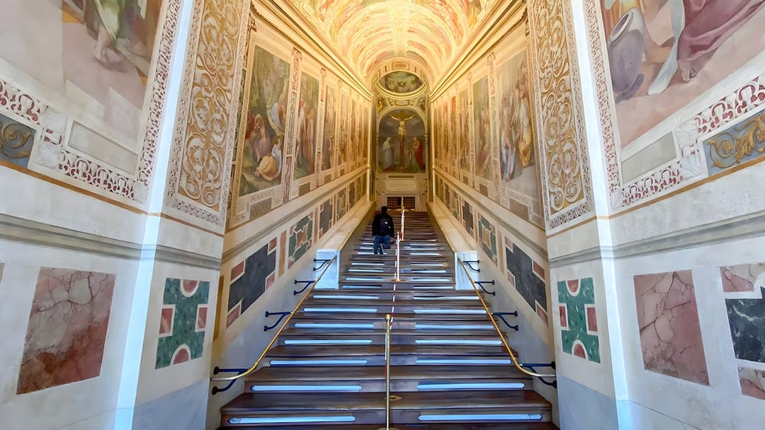 St. John Lateran Basilica interior staircase with frescoes in Rome, Italy.