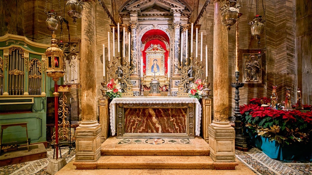 St. Mark's Basilica altar with ornate decorations and religious iconography in Venice, Italy.