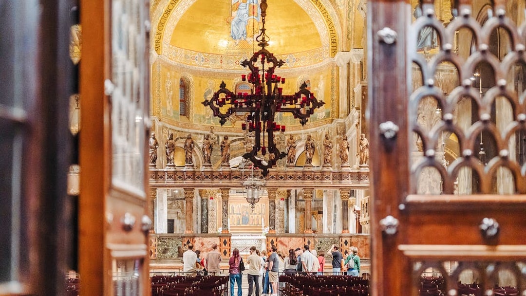 Visitors inside St. Mark's Basilica during an exclusive after-hours tour in Venice.