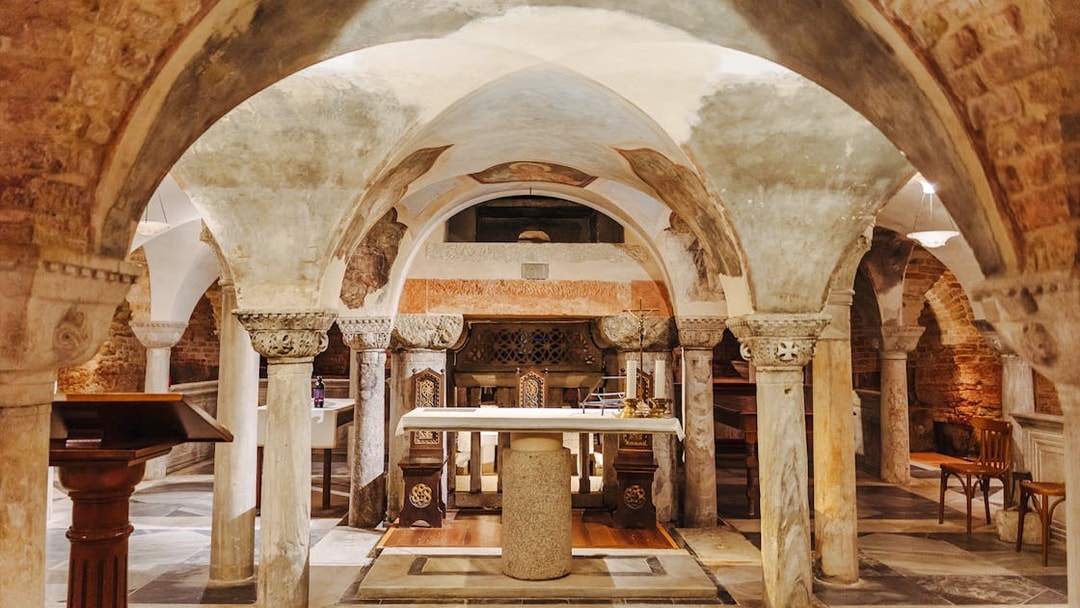St. Mark's Basilica crypt with ornate columns and altar during exclusive after-hours tour.