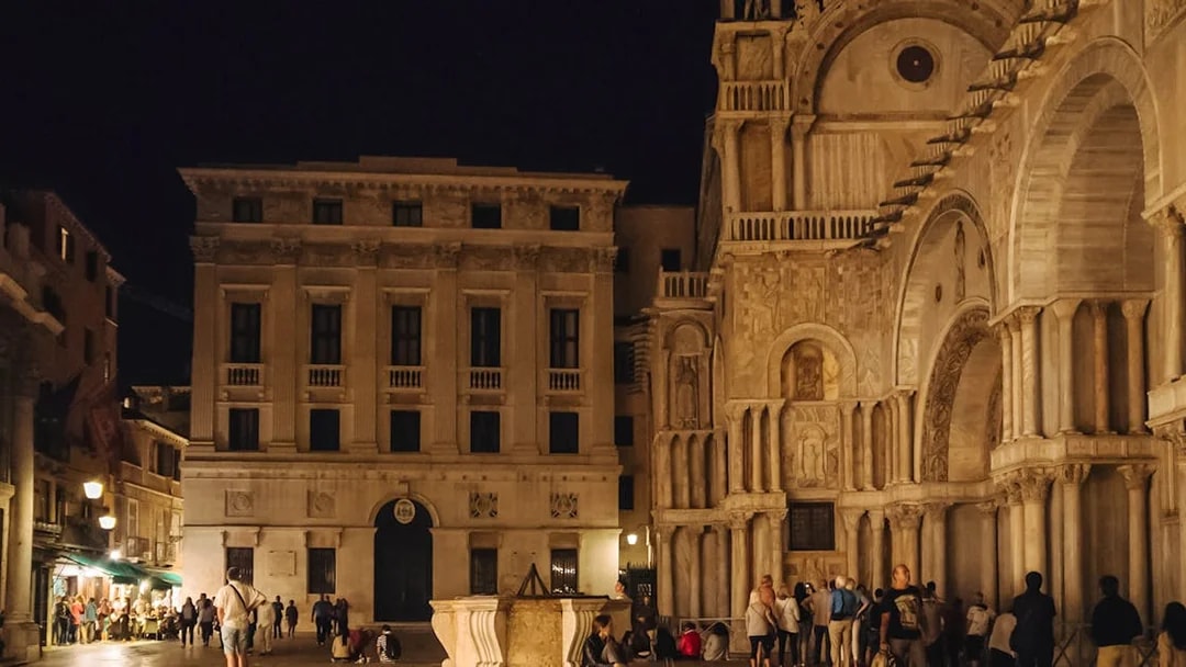 St. Mark's Basilica exterior at night during exclusive after-hours tour in Venice.