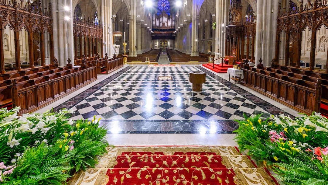 St. Patrick's Cathedral interior with ornate altar and checkered floor, New York City.