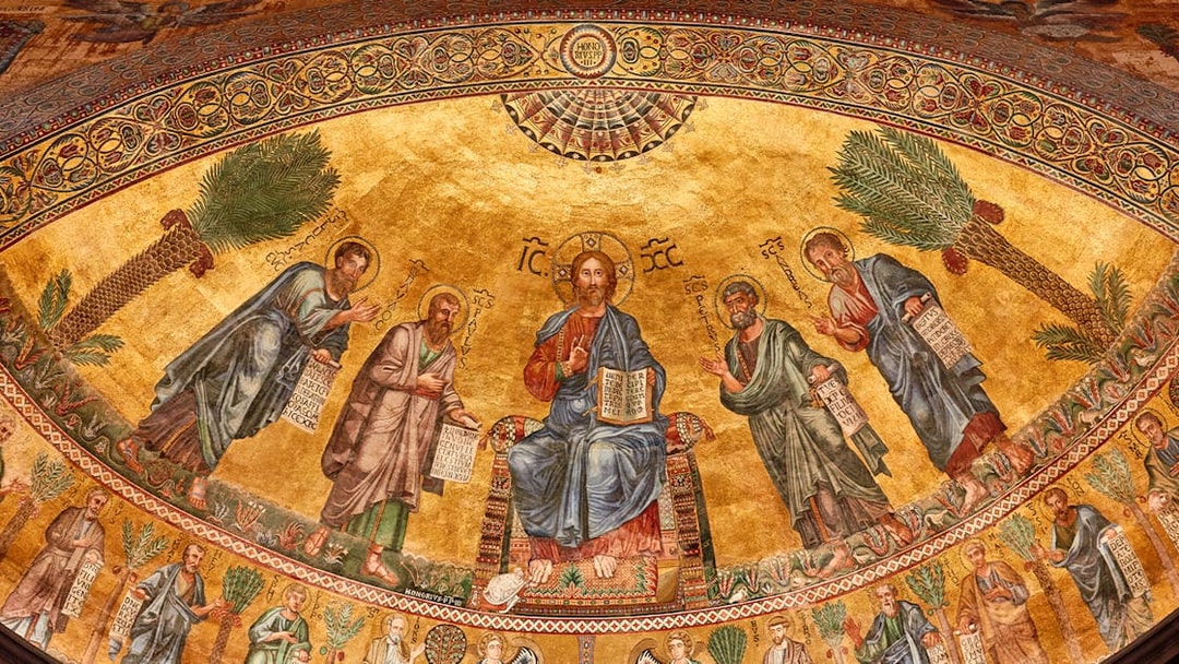 Mosaic of Christ with apostles at St Paul Cathedral, featuring intricate gold background.