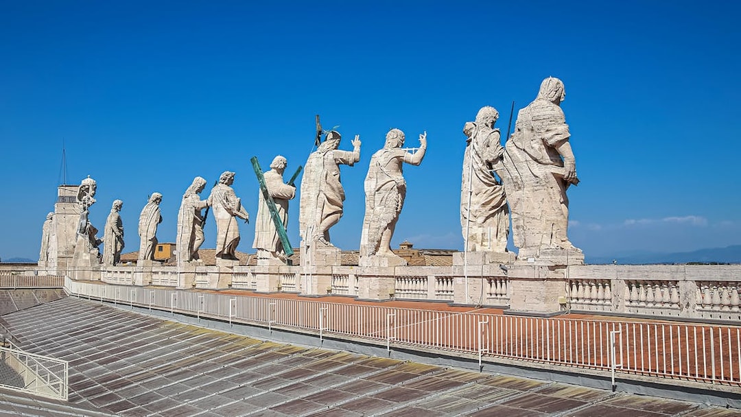 Statues atop St. Peter’s Basilica Dome during guided tour in Vatican City.