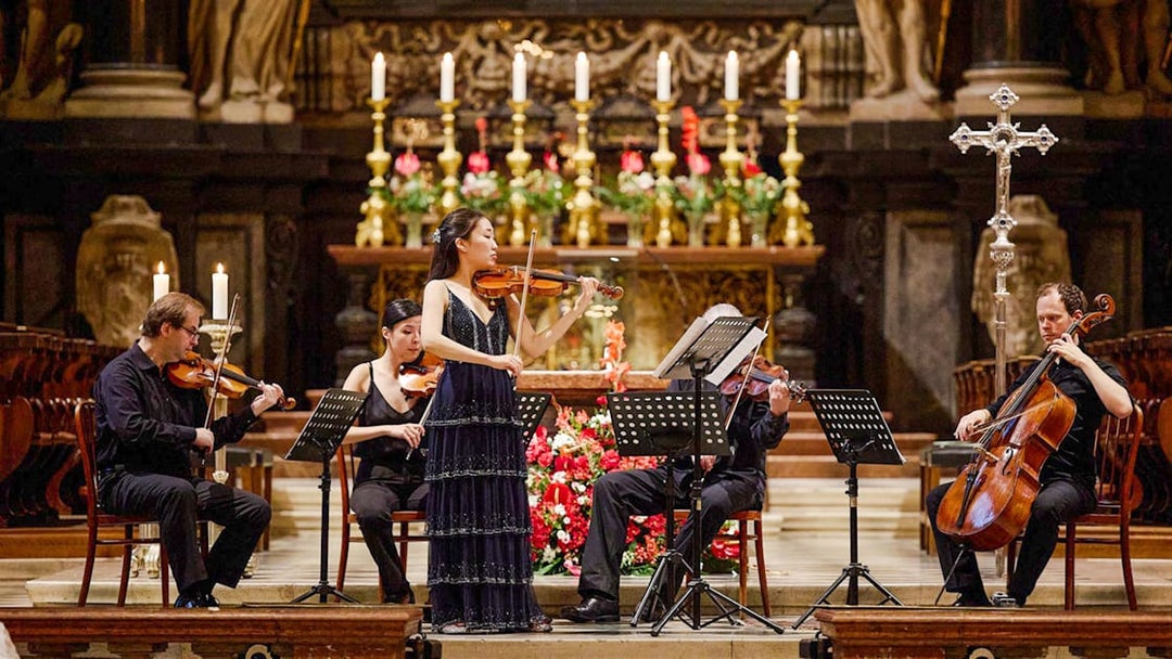 Orchestra performing inside St. Stephen's Cathedral, Vienna.