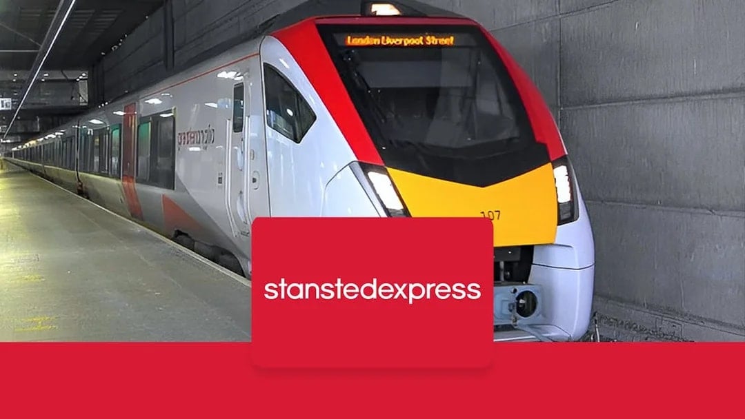 Stansted Express train at platform for London Liverpool Street route.