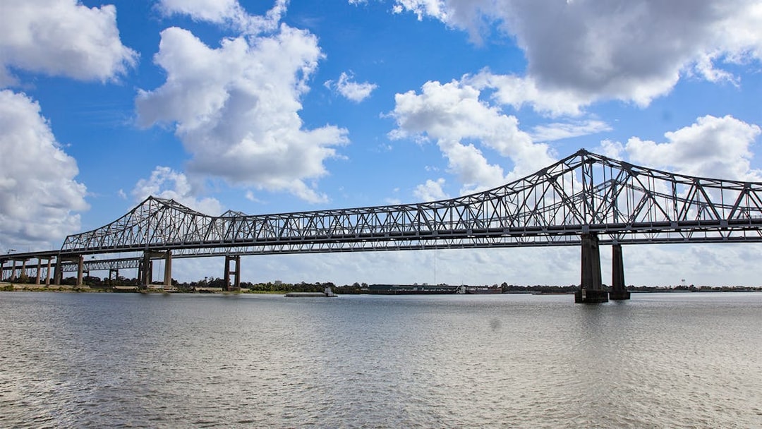 New Orleans bridge spanning Mississippi River viewed from Steamboat Natchez.