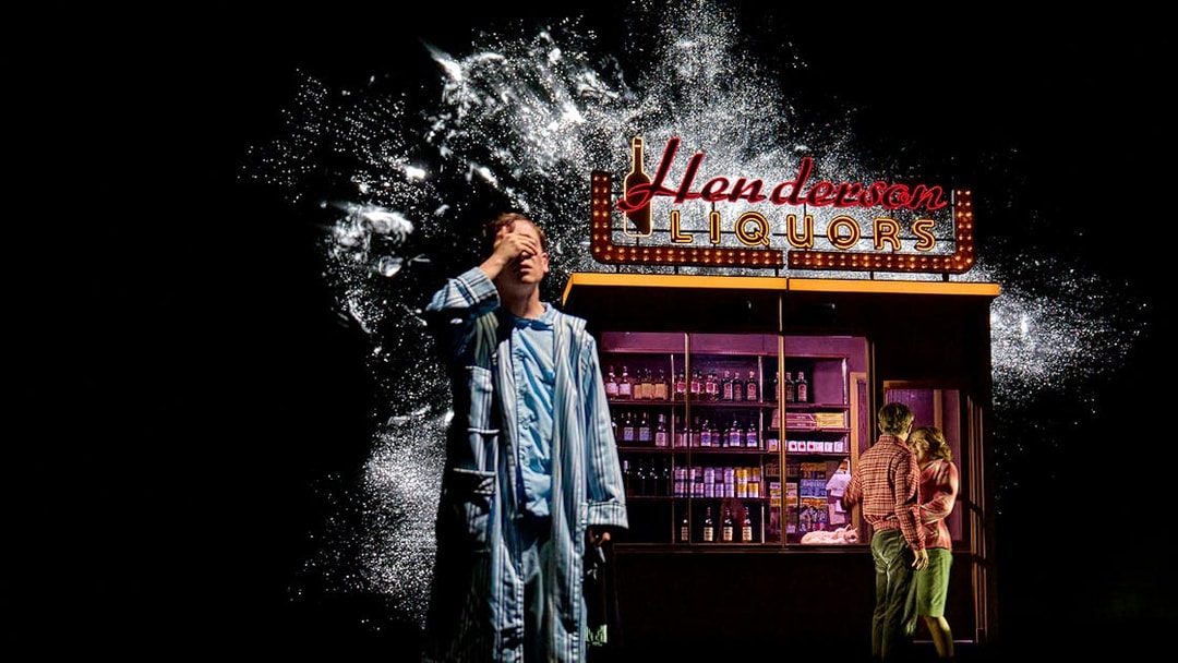 Man in pajamas near Henderson Liquors sign, couple embracing, Stranger Things: The First Shadow.