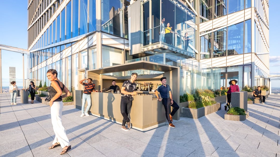 Group enjoying the terrace at SUMMIT One Vanderbilt, New York City.