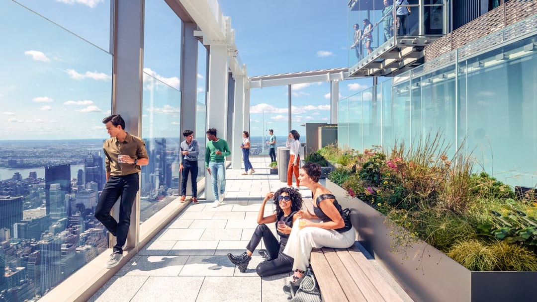 Group enjoying views from SUMMIT One Vanderbilt observation deck, New York City.