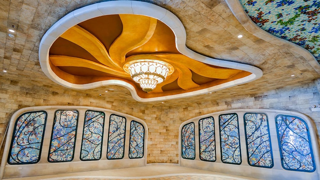 Stained glass windows and ornate ceiling inside Sun World Ba Den Mountain.