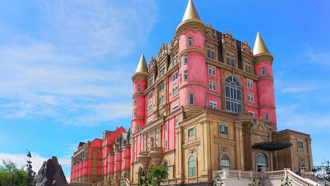 Luna Castle in Ba Na Hills, Da Nang, Vietnam with pink and gold towers.