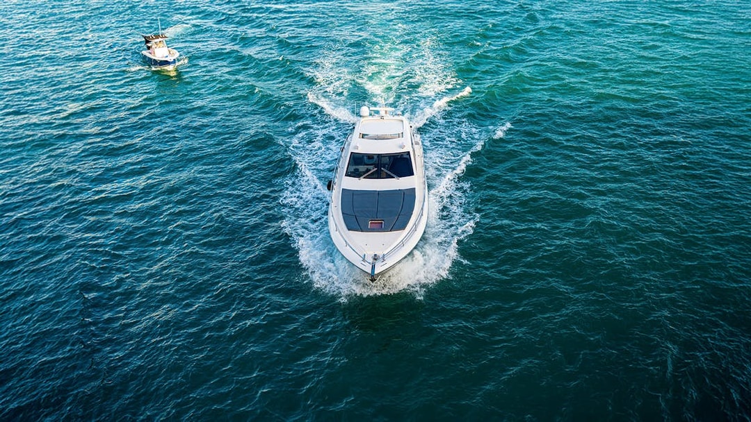 Boat cruising on Biscayne Bay during a South Beach sunset tour.