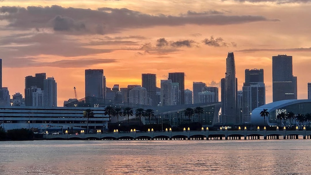 Sunset over Miami skyline viewed from Biscayne Bay during South Beach cruise.