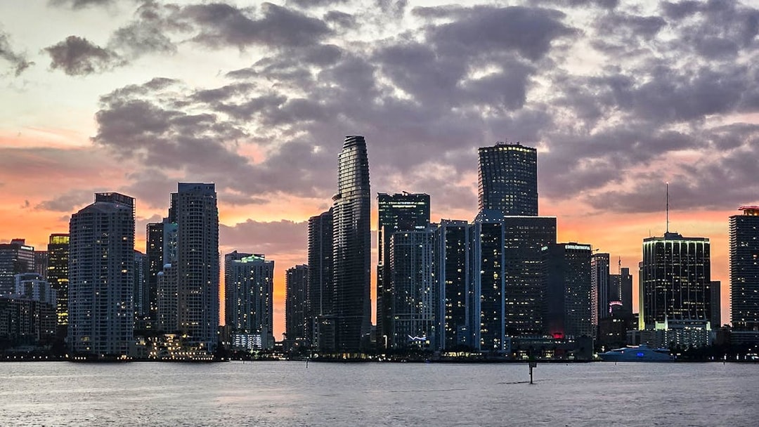 Skyline of Miami at sunset viewed from Biscayne Bay during a South Beach cruise.