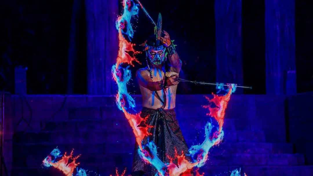 Performer with glowing fire effects at Sunway Lost World Hot Springs Night Park.