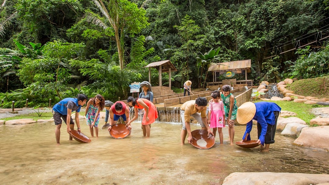 Visitors panning for gold at Sunway Lost World of Tambun, Malaysia.