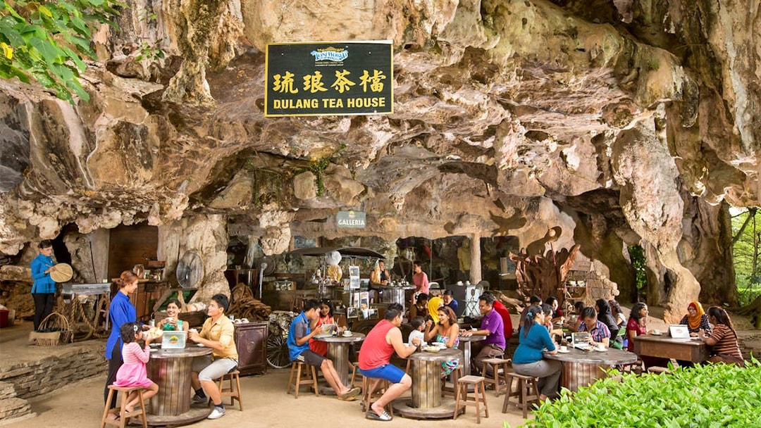 Visitors enjoying tea at Dulang Tea House, Sunway Lost World of Tambun, Malaysia.