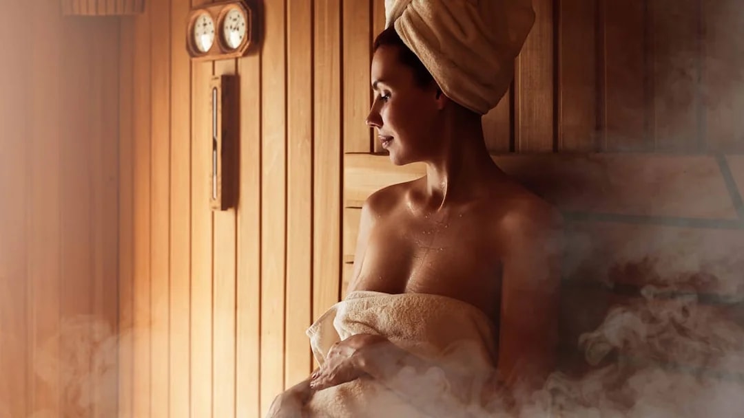 Person relaxing in a sauna at Szechenyi Thermal Spa, Budapest.