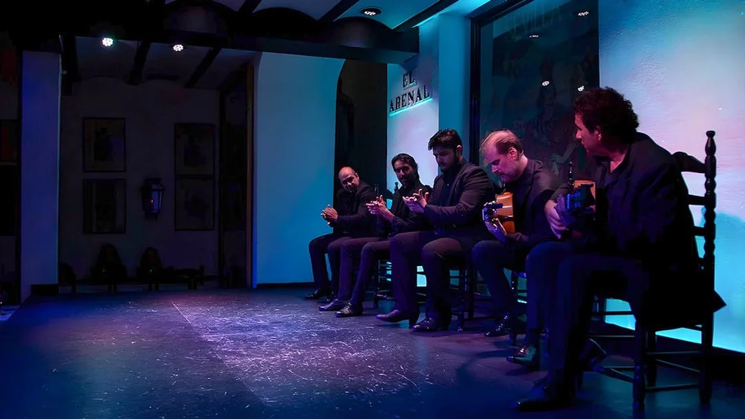 Musicians performing at Tablao El Arenal Flamenco show in Seville.