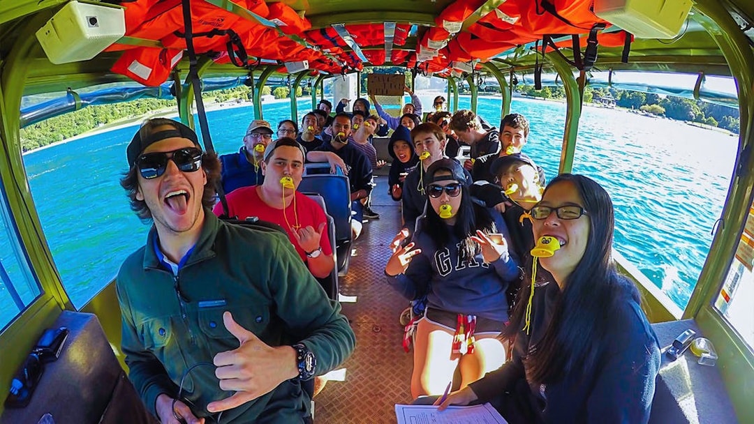 Tour group enjoying a Rotorua City and Lakes amphibious vehicle ride.