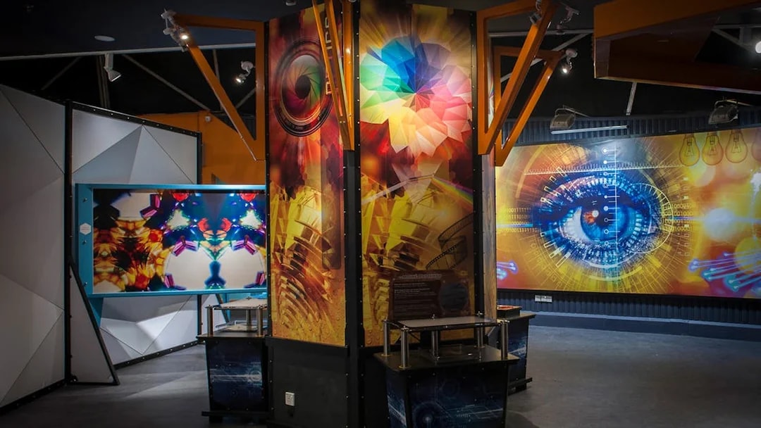 Interactive exhibit with colorful digital displays at Tech Dome Penang.