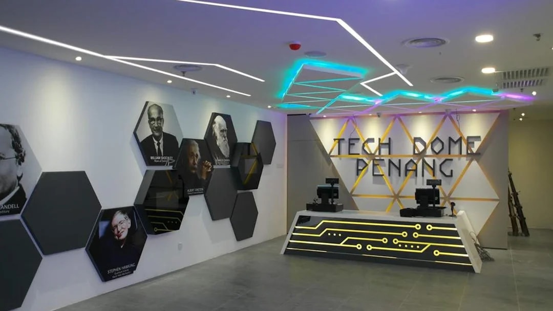 Tech Dome Penang entrance with geometric wall art and reception desk.