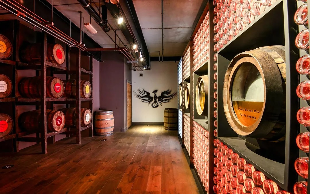 Barrels and wall display inside Teeling Whiskey Distillery, Dublin.