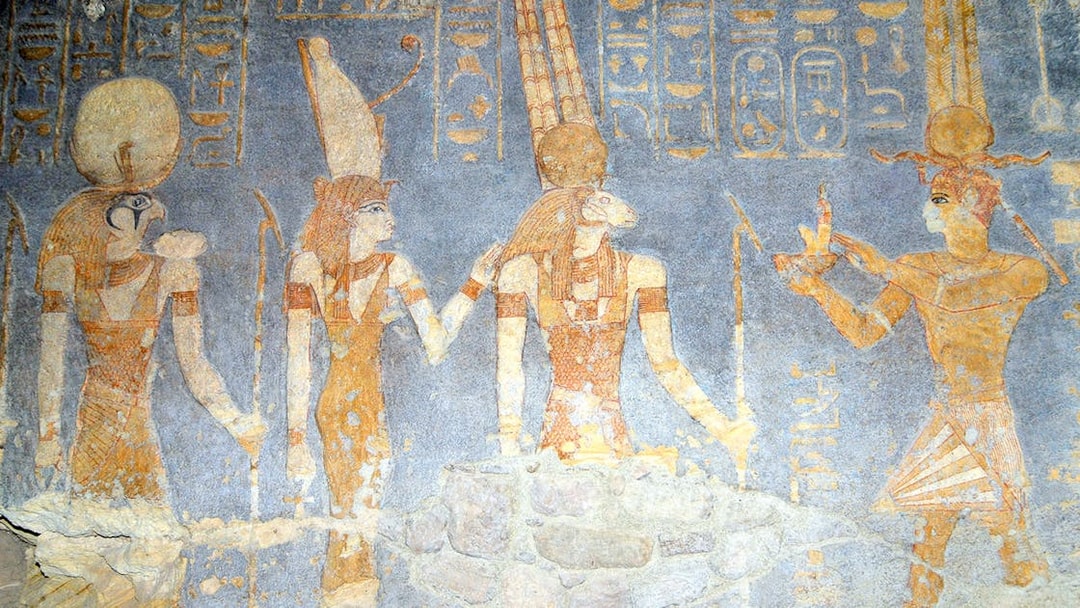 Ancient Egyptian deities depicted in Hathor Temple wall paintings.
