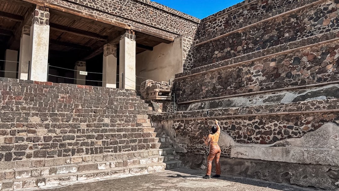Entrance to the Palace of Quetzalpapalotl with stone walls and columns in Teotihuacan.
