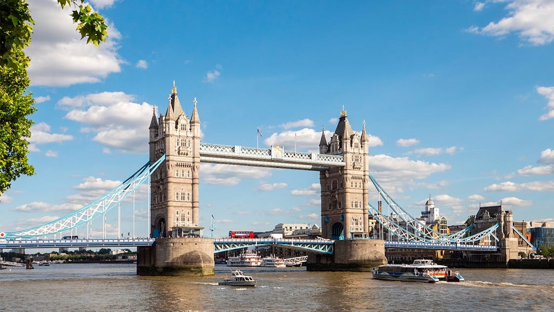 Tower Bridge viewed from a sightseeing cruise on the River Thames.